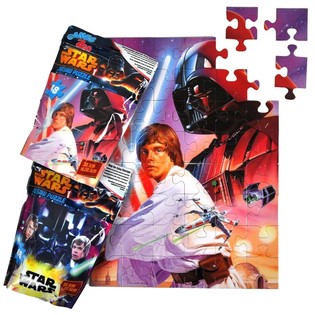 Star Wars puzzle v neprůhledn&eacute;m s&aacute;čku blindbag 38,1 x 28,5 cm (12 ks)